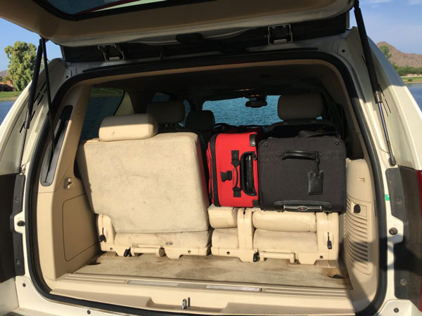 Image of Cadillac Escalade Luggage space with one half bench folded
